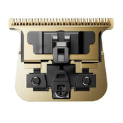 Gold and black hair trimmer head on a white background