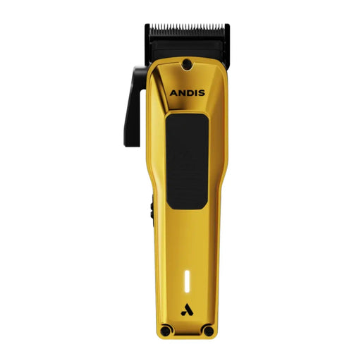 A handheld electric hair clipper in metallic gold with black accents, including the clipper head, side lever, and grip panel. The brand name 'ANDIS' is printed in black on the front, and a small illuminated indicator light is visible near the bottom.