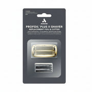 Gold foil and two black razor heads on a white background
