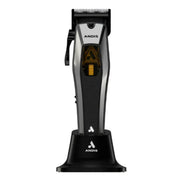 ANDIS cordless hair clipper with a black and silver body, gold accent, and a matching black charging stand on a white background.
