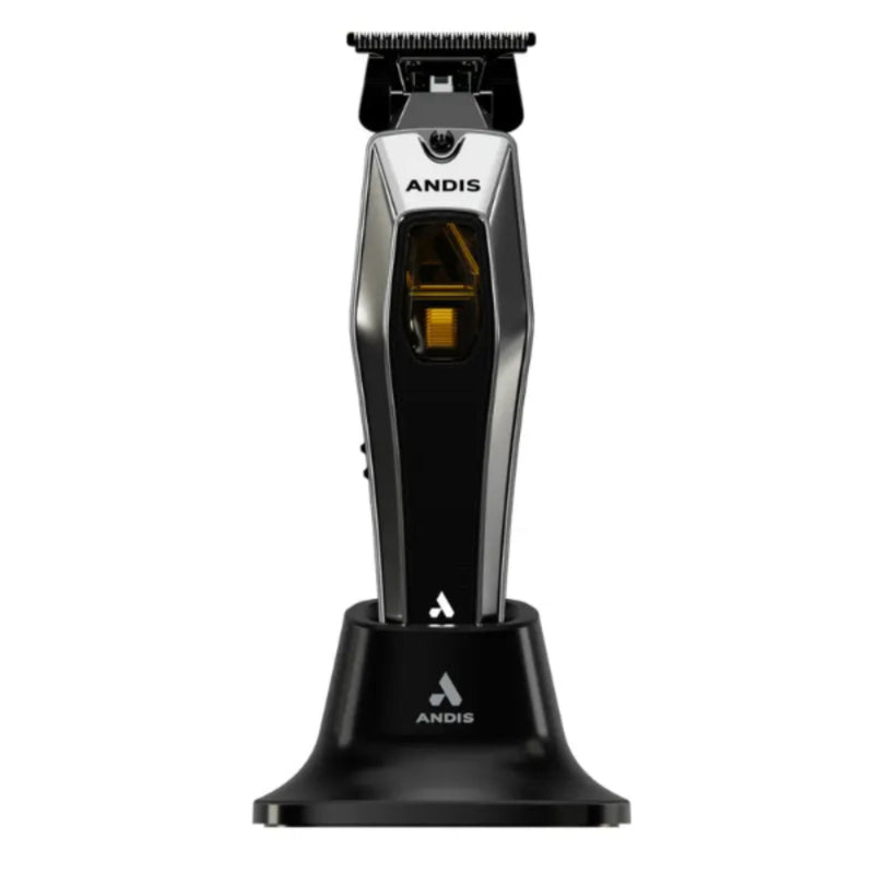 An Andis electric hair clipper standing upright on its black charging base against a plain white background.