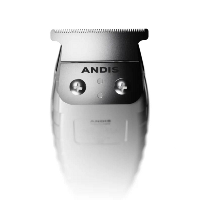 A close-up studio shot of an ANDIS electric hair clipper head, showing the metallic silver blade, adjustment screws, and the brand name ANDIS on the front, set against a white background with a soft reflection below.
