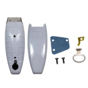 Grooming kit with a white device, cover, blue pad, and screws on a white background