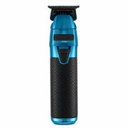 A Barbed Scape hair clipper shown vertically against a solid white background. The clipper features a metallic blue body with a black textured grip handle and a black brand plate.
