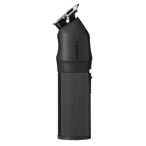 A black handheld rotary hair clipper with a ribbed cylindrical body and a metallic clipper head, shown on a plain white background. The brand name COREFX is printed vertically on the side.