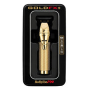 GoldFaX+ Gold BaBylissPRO 3900 hair clipper in its original black packaging, featuring a textured gold handle and metallic gold clipper head.