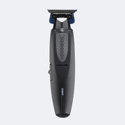 Black and blue electric shaver on a light gray background
