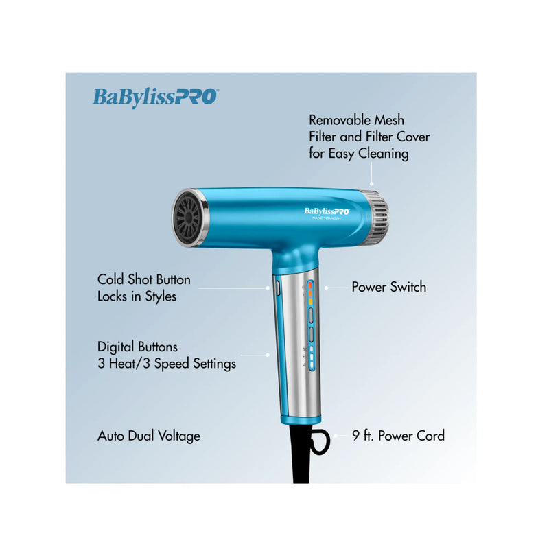 A blue and silver BabylissPRO hair dryer shown on a light blue background with callout labels pointing to features such as the cold shot button, digital buttons, power switch, and filter cover.