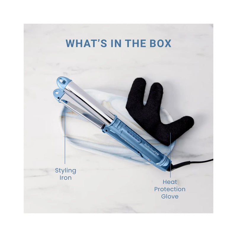 A styling iron and a black heat protection glove displayed on a white marble background under the heading 'WHAT'S IN THE BOX'.