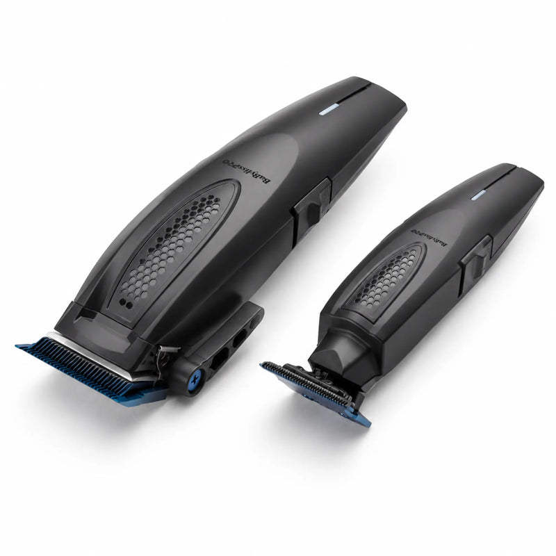 Angled view of BaBylissPRO LithiumFX+ clipper and trimmer with blue titanium blades