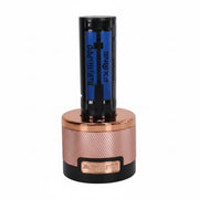 A single EXONE B881 HS PRO rechargeable lithium-ion battery standing upright in a metallic rose gold and black cylindrical charging dock or battery holder, isolated on a white background.