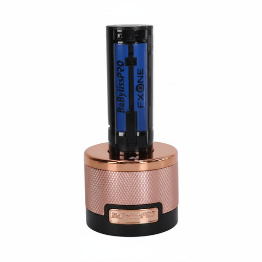 A single EXONE B881 HS PRO rechargeable lithium-ion battery standing upright in a metallic rose gold and black cylindrical charging dock or battery holder, isolated on a white background.