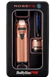 RoseFX BaBylissPRO Pro 2000 cordless trimmer kit in a black retail box, featuring a rose gold trimmer, a blue and black cleaning brush, and a small attachment tool.