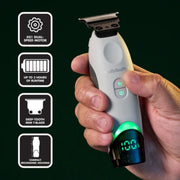 A hand holds a Babyliss Pro DS1 dual-speed electric trimmer against a dark green background, with four feature callout icons on the left highlighting the DS1 dual-speed motor, up to 3 hours of runtime, deep-tooth mini blade, and compact ergonomic housing.