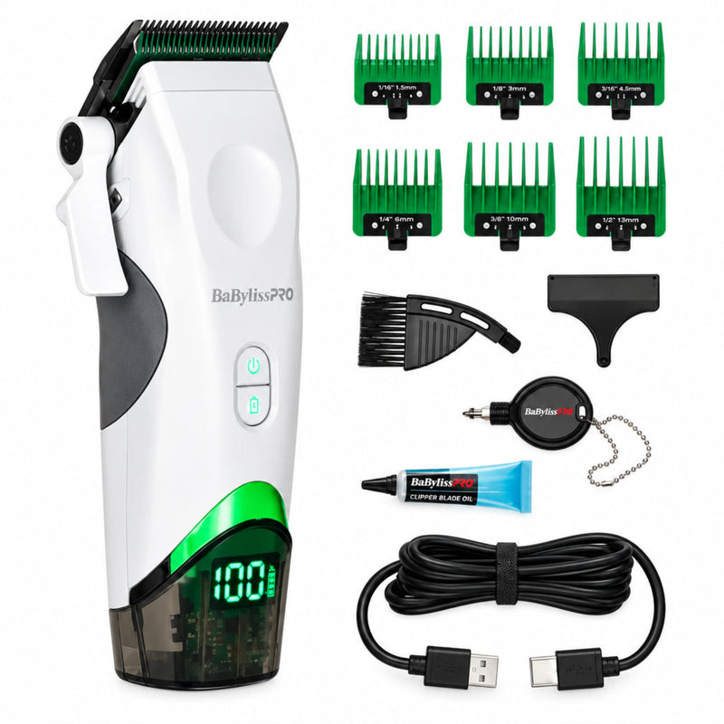 BaByLissPRO electric hair clippers shown with multiple green guide combs, a black cleaning brush, a black storage case, a USB charging cable, and a small tube of skin-tone adhesive, all arranged on a white background.