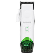 A BaBylissPRO cordless hair clipper shown from a front-facing perspective on a solid white background. The clipper features a white plastic body with a green accent band near the base, a black cutting head, and a green LED display showing '0.