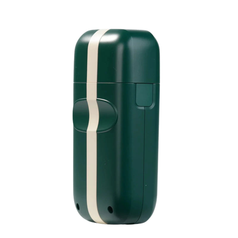 Cocco Veloce Lite green foil shaver with cap removed showing dual foil blades for close shave detailing