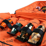 Close-up of barber clippers secured inside Cocco backpack organizer with straps and protective compartments
