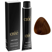 Créé hair color kit showing a black box, a black tube of cream-colored hair dye, and a triangular sample of the resulting medium brown hair color on a white background.