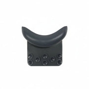 A dark gray crescent-shaped headrest support with a textured base and six circular suction cups, shown against a plain white background.
