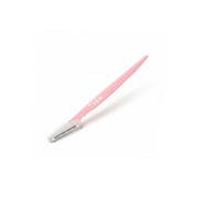 Pink eyebrow razor with 'Tinkle' branding on a white background