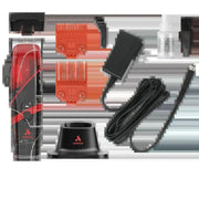 A 3D exploded-view graphic showing the components of a red and black laser engraver kit, including the main laser head, orange heat sinks, a black power adapter, a black cable, a black stand, and a small clear bottle, set against a white background with horizontal gray stripes.