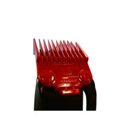 A red plastic clipper guide comb attachment with embossed text reading '1.5"' and 'ANDIS', shown attached to a black clipper against a plain white background.