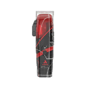 A close-up of a black and red hair clipper with a clear protective cover, showing the brand logo and 'KD' marking on the side.