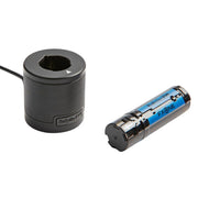 Two electronic components on a white background, one charging base and one battery.