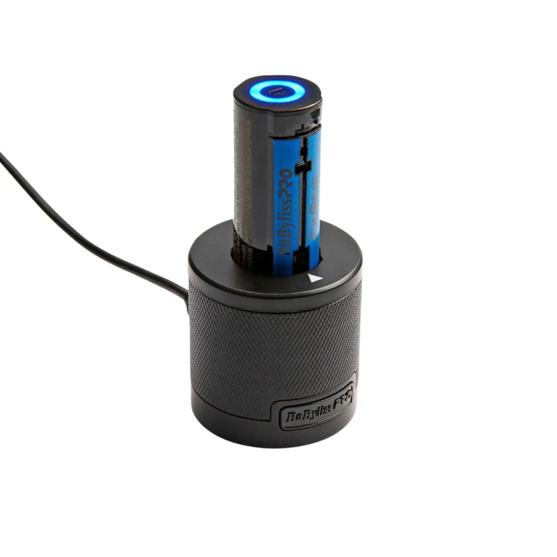 Black electronic device with blue light on a white background