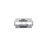 Shaving razor blade with 'Hairy Monkey' branding on a white background
