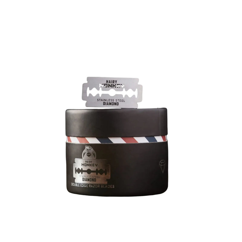 Black container with a brand logo and a razor blade on a white background