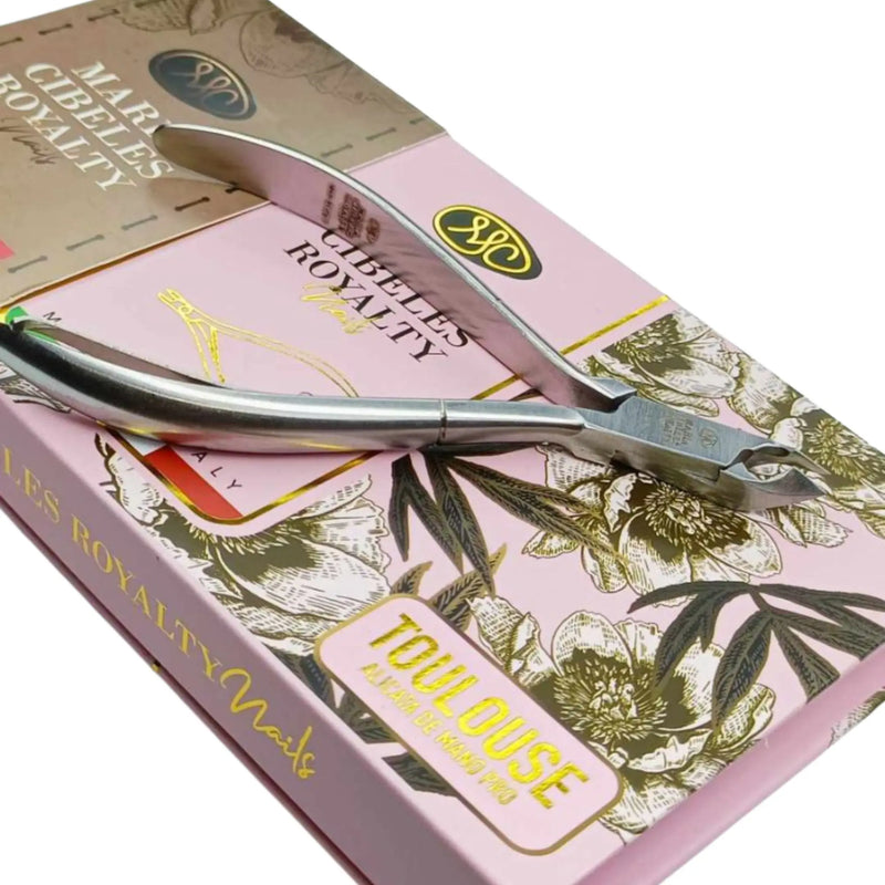 Nail clippers on a floral-themed box with 'Marie Lelies Royalty Nails' branding.
