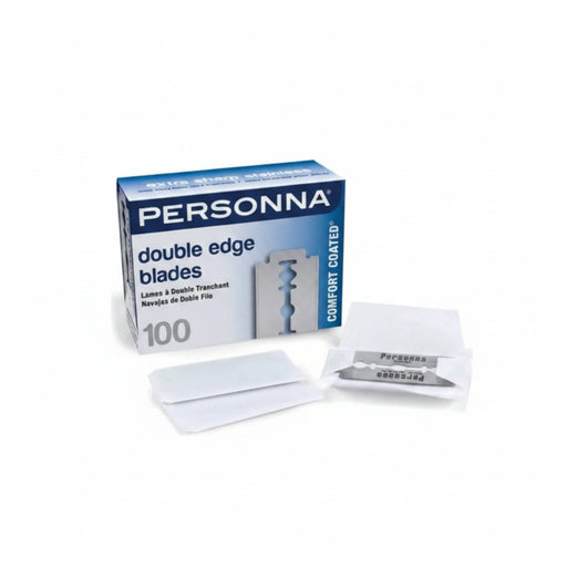 A box of PERSONNA double edge blades with several white disposable razor blades and a single blade in its paper sleeve displayed in front on a white background.