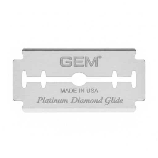 Shiny metal razor blade with 'GEM' branding on a white background