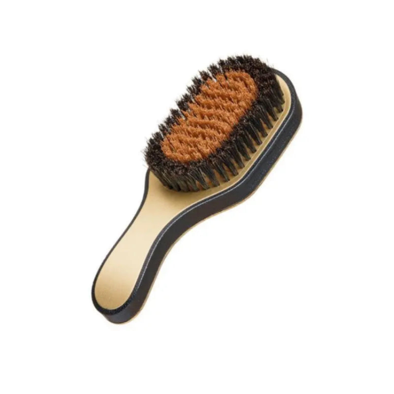 A hairbrush with a black outer frame, beige handle, and brown and black bristles, shown on a plain white background.
