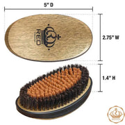 An oval hair brush shown with dimension annotations: top view labeled 5" D and 2.75" W, and side view labeled 1.