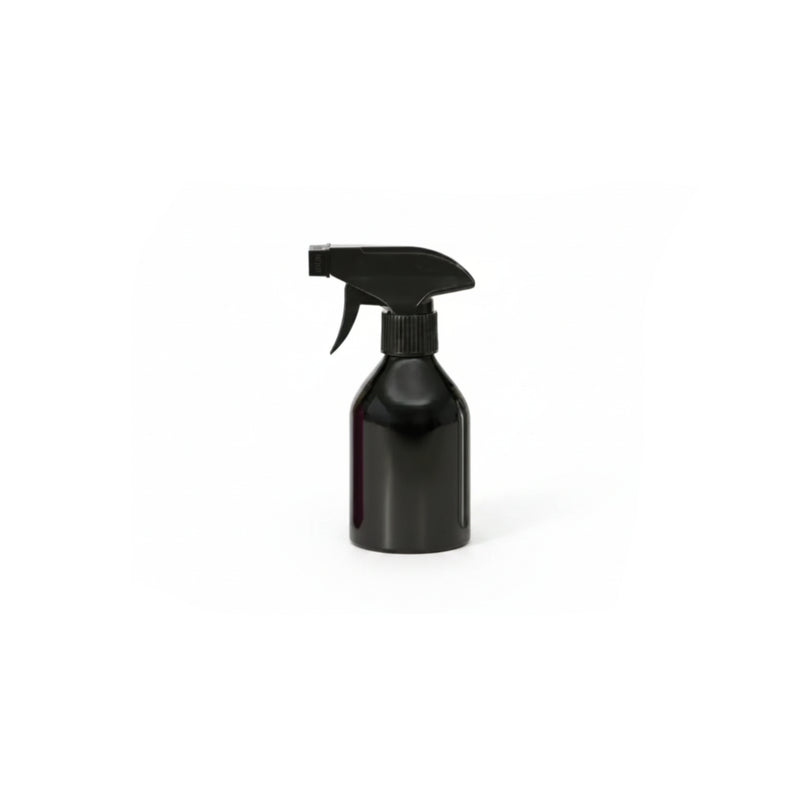 A glossy black plastic spray bottle with a trigger sprayer, isolated on a white background.