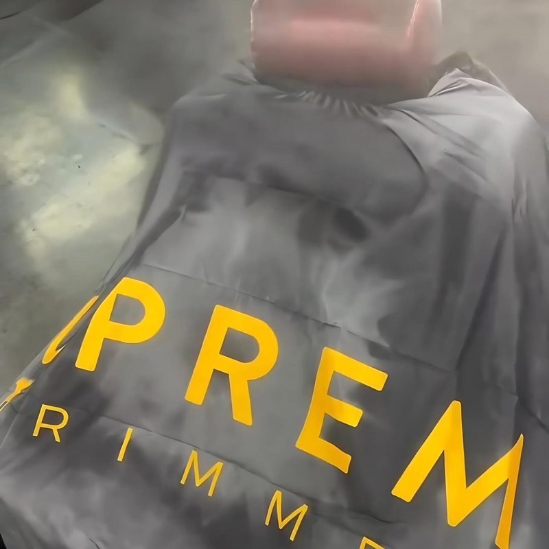 Capa de barbero prémium Supreme Trimmer