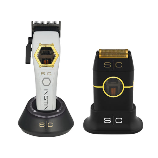 White and gold metal StyleCraft Instinct cordless clipper on charging base beside matching black and gold foil shaver.