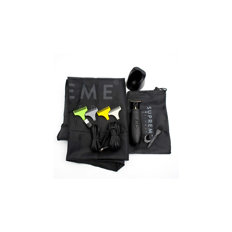 Supreme Trimmer T-Shaper DLC black cordless trimmer with barber cape, charging base, guards, and accessories.